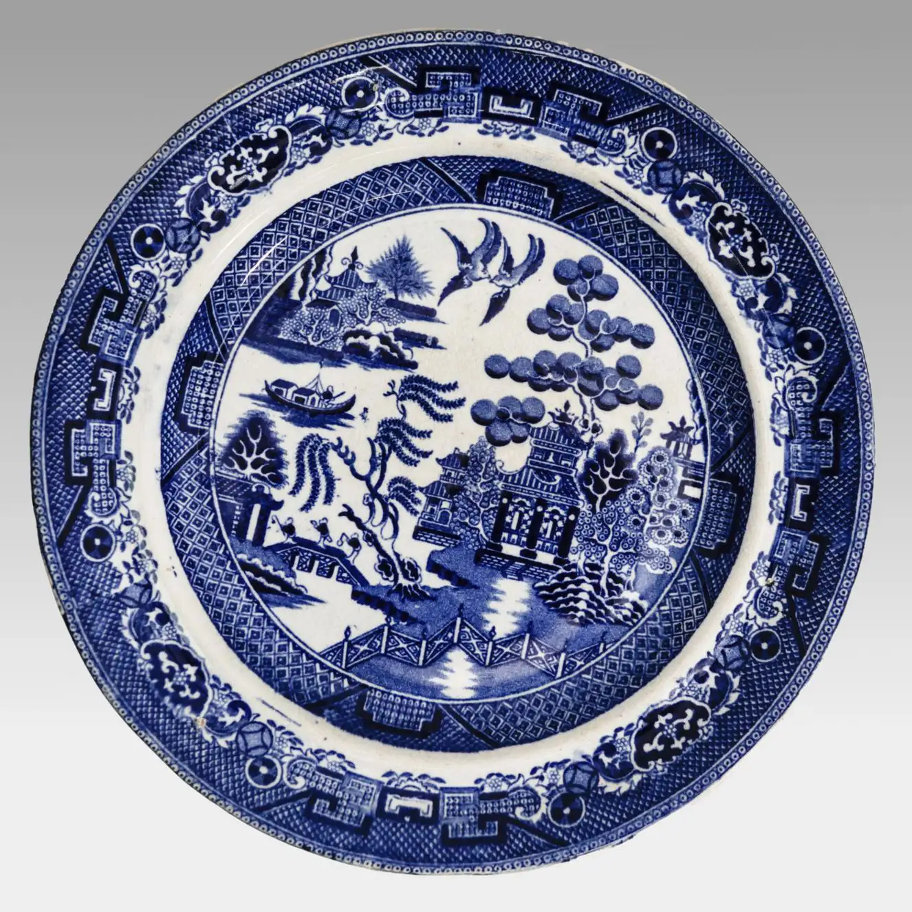 309 - Teller mit blau-weißer Landschaftsdekoration (Willow Pattern)